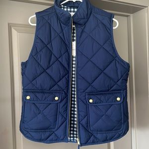 BNWT J Crew Factory Navy Puffer vest with gingham lining.